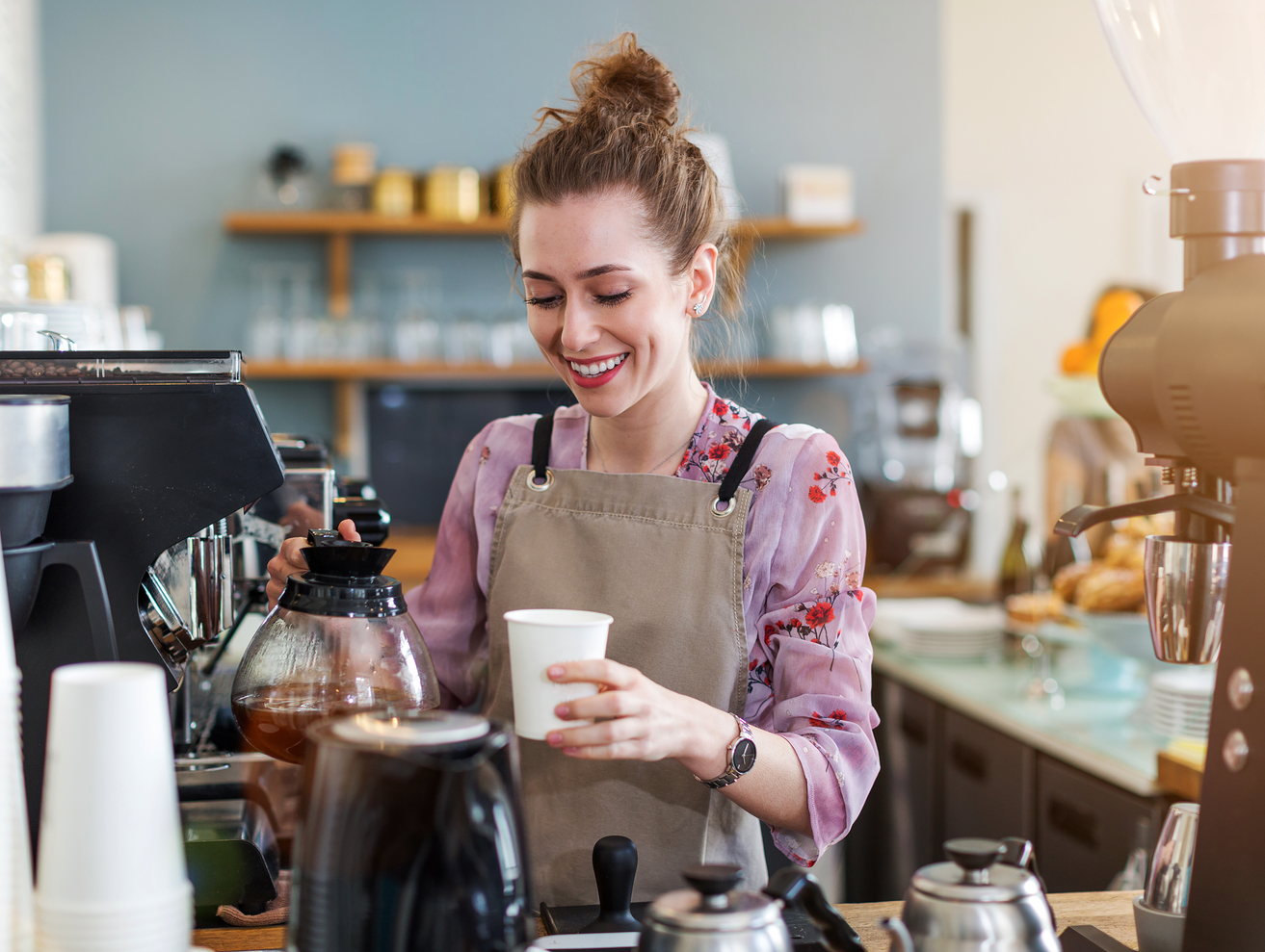 Girl pouring coffee