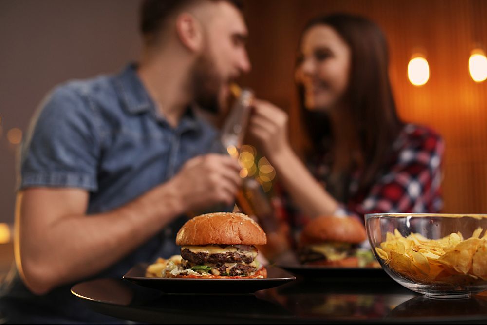 pair eats a burger